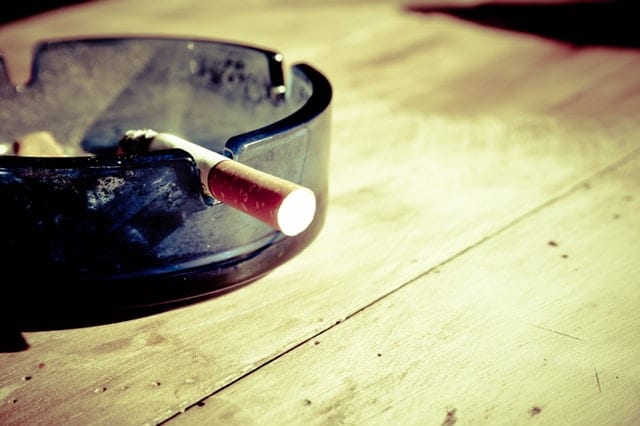 cigarette in an ash tray 