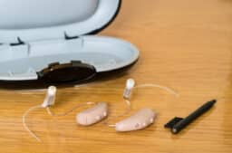 Hearing aids and wax pick